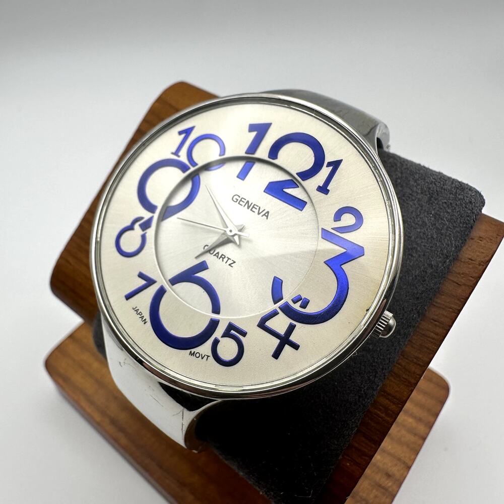 Geneva Quartz Cuff Watch Silver Tone Cream Dial Blue Numerals